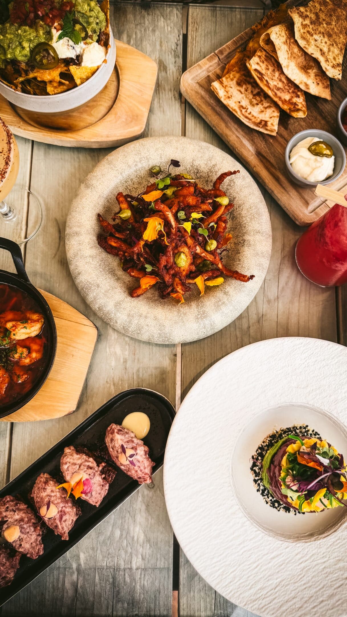 Lunch tastes better when it’s shared.

Sun on the terrace, cocktails in hand, and a table full of your favourites. ☀️🍹✨

This is your sign to book that long lunch.